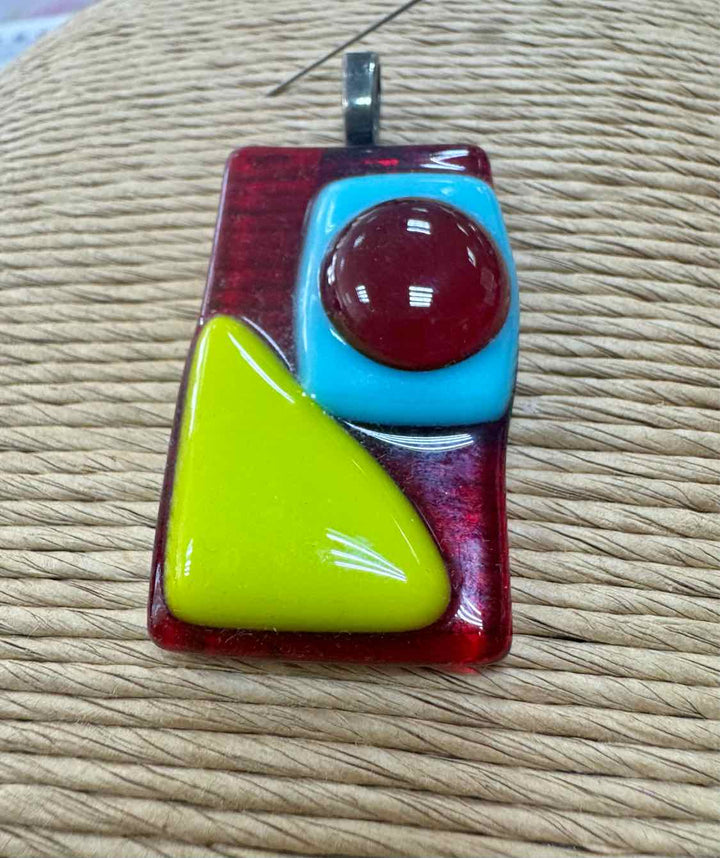 SwirlyQs Size M/L Red NWT Pendant only