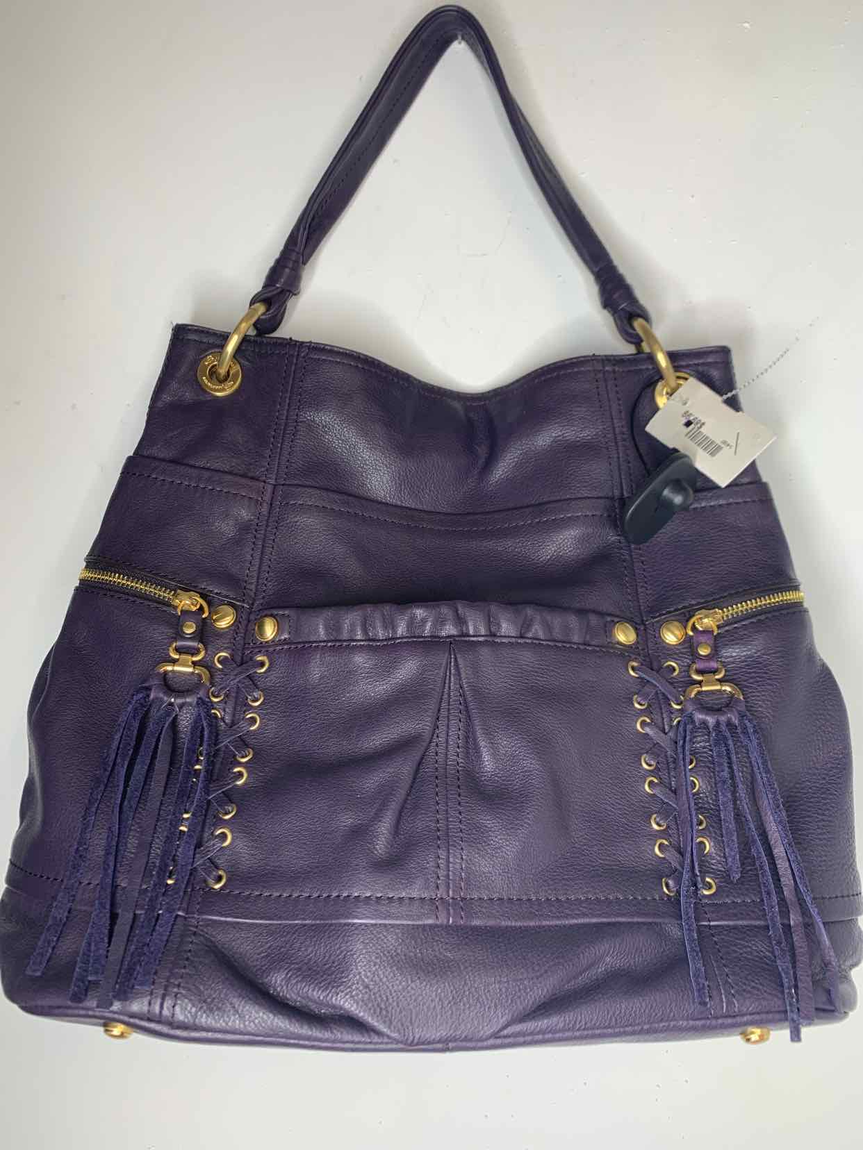 B. selling Makowsky purple leather messanger bag