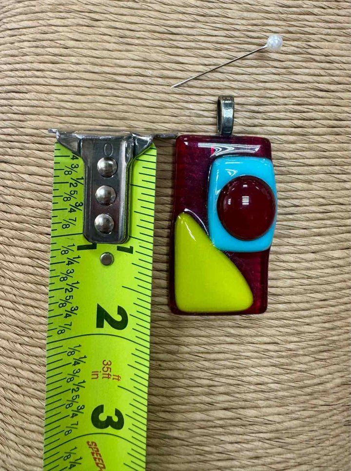 SwirlyQs Size M/L Red NWT Pendant only