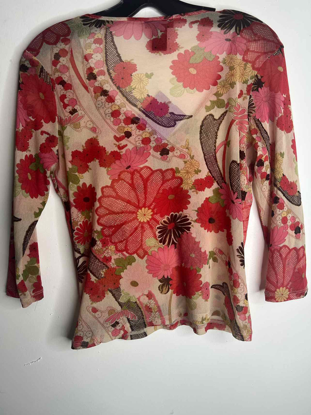 The limited Women Size M floral long sleeve top