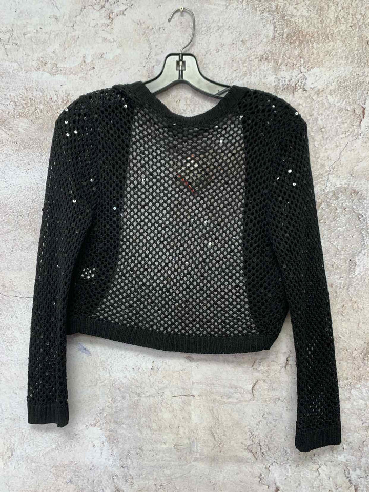 The limited Size M Black shrug