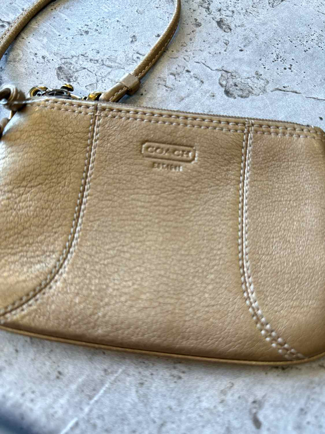 Coach gold wristlet