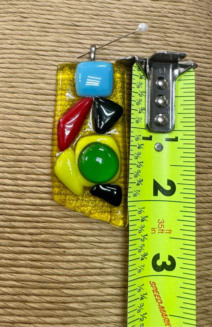 SwirlyQs Size M/L Yellow NWT Pendant only